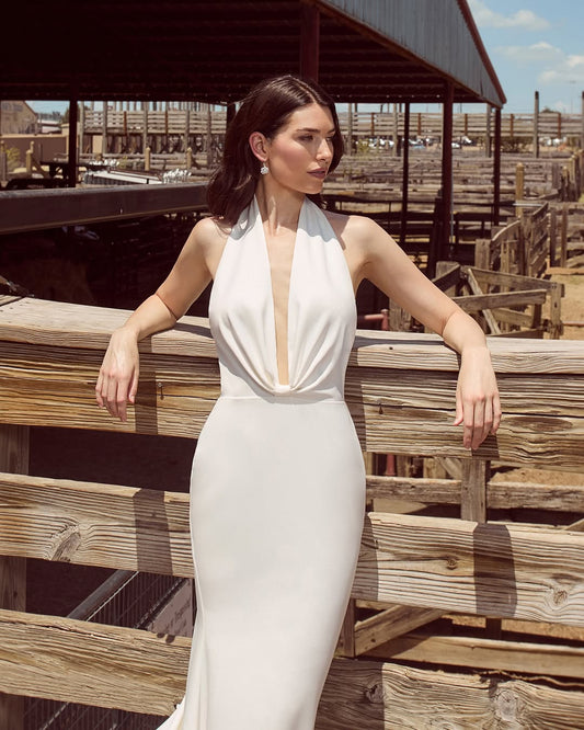 Simple White Sleeveless Deep V-Neck Meramid Prom Dress