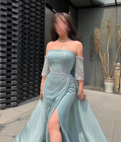 Stunning Blue Tulle Strapless Beaded Middle Sleeves Prom Dress with Split