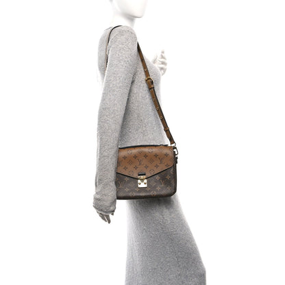 Reverse Monogram Pochette Metis