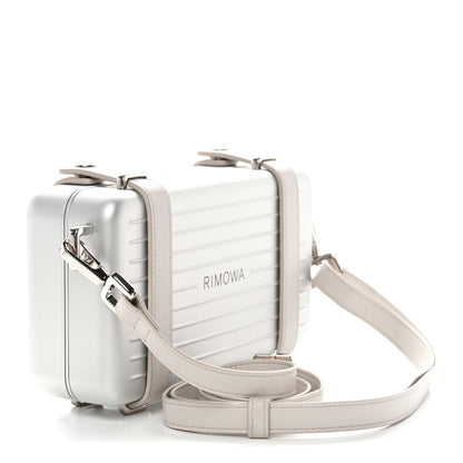 X RIMOWA Aluminum Personal Clutch On Strap Silver