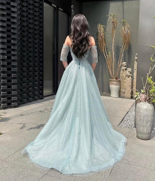 Stunning Blue Tulle Strapless Beaded Middle Sleeves Prom Dress with Split