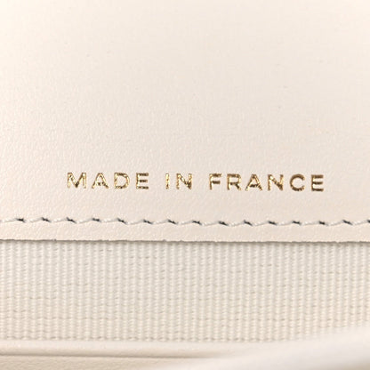 Shiny Caviar Quilted Flap Charm Wallet On Chain WOC White
