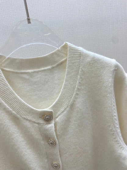 CHANEL 25S SHORT-SLEEVE ROUND-NECK KNIT CARDIGAN 317