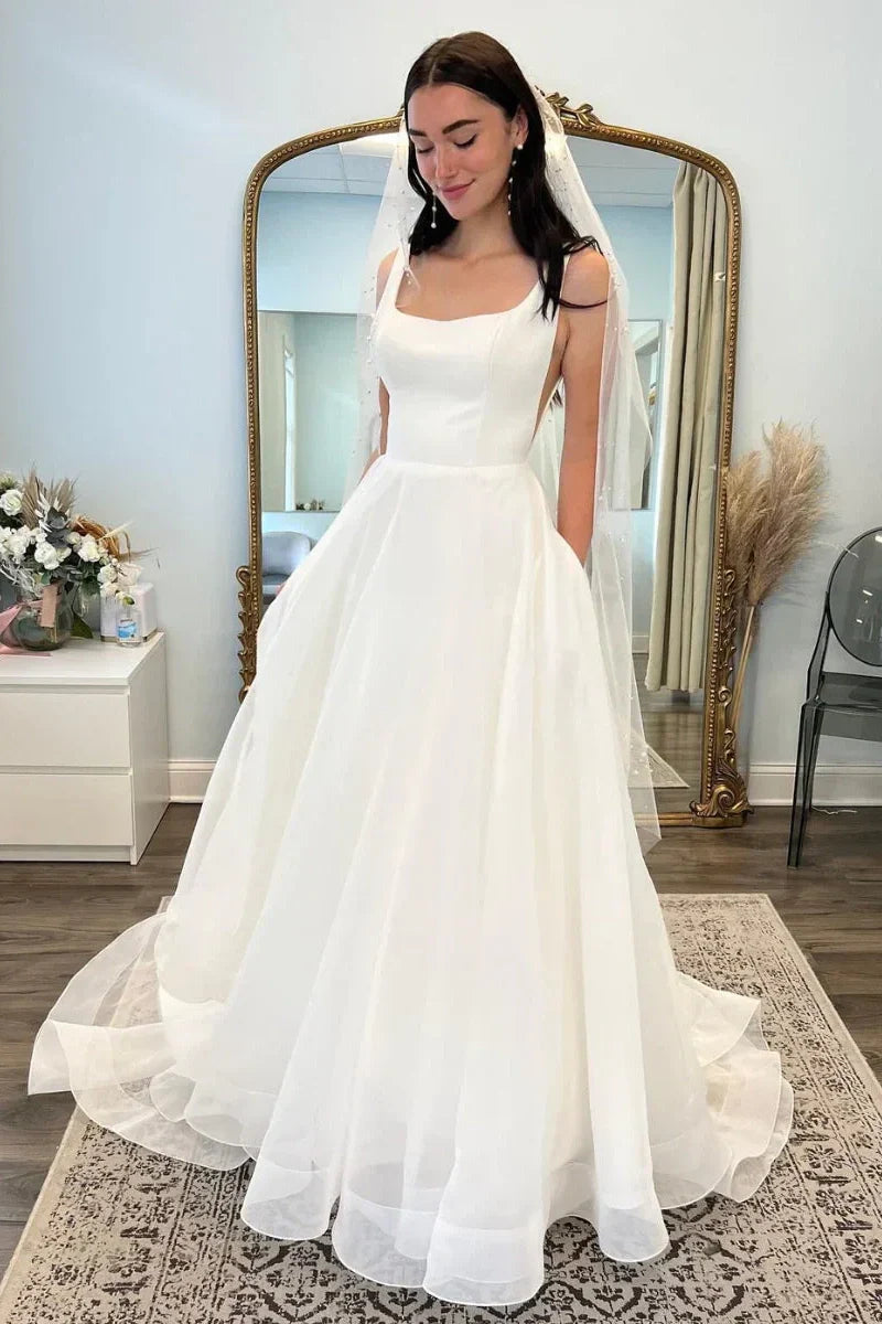 Bateau Sleeveless Backless A-Line Wedding Dress With Train