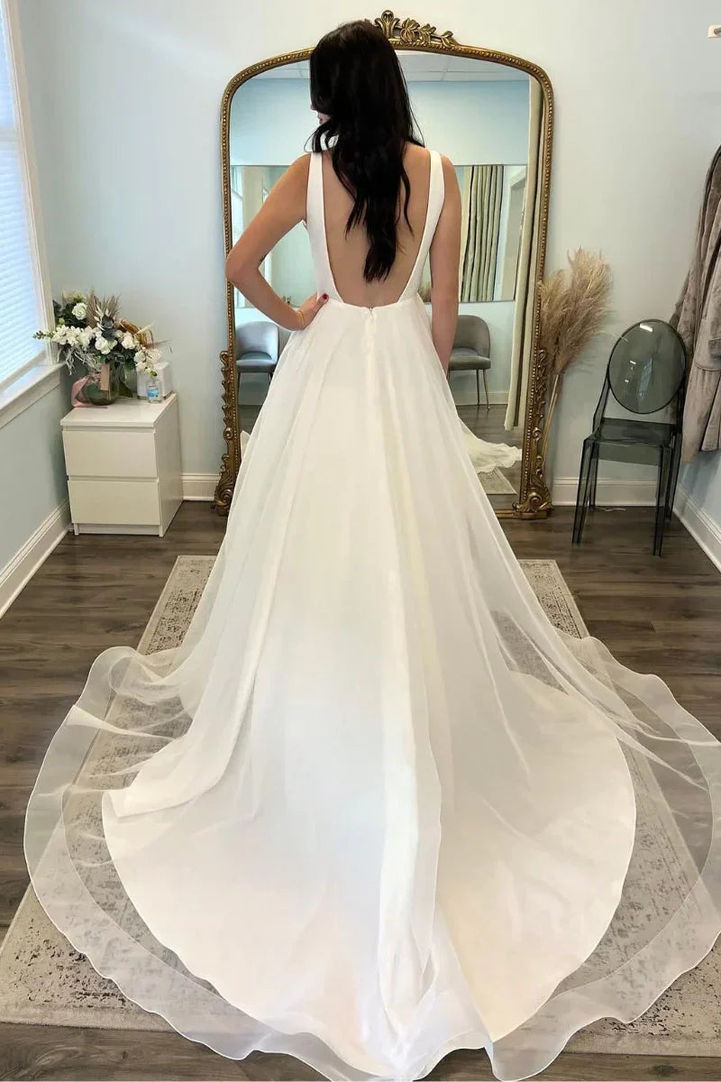 Bateau Sleeveless Backless A-Line Wedding Dress With Train