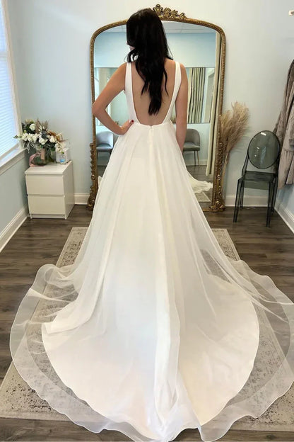Bateau Sleeveless Backless A-Line Wedding Dress With Train