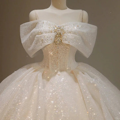 Elegant Off-the-shoulder Ball Gown Bridal Dress Glitter Tulle Wedding Dress Beaded Bridal Gown ED03701