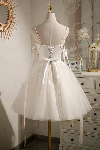 Black Beaded Cut-Out Bow Tie Straps Homecoming Dress