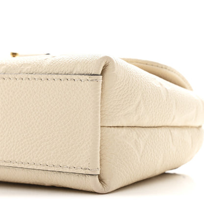 Empreinte Monogram Nano Madeleine Creme