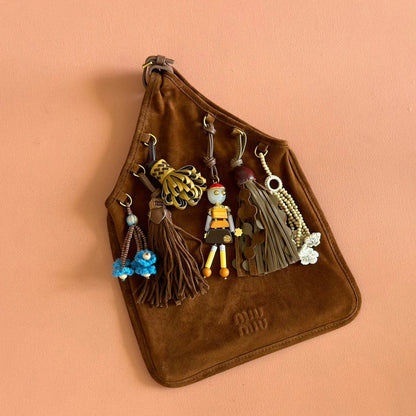 SUEDE BAG WITH TRICK 37 DARK BROWN